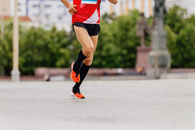 Low section of man running