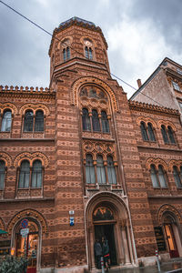 Low angle view of historic building against sky