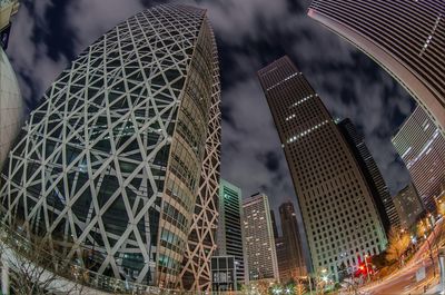 Low angle view of tower against cloudy sky