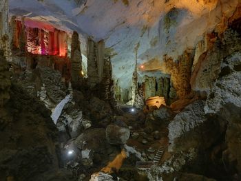 Illuminated buildings in cave