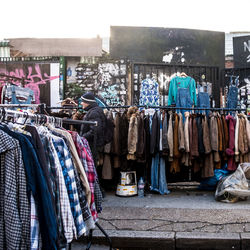 Clothes hanging on rack in store