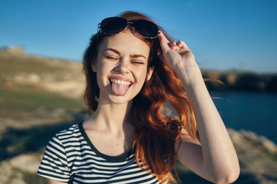 Portrait of smiling young woman