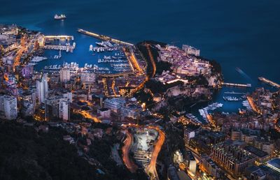 High angle view of illuminated buildings at night