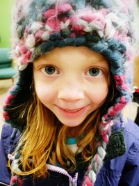 Portrait of smiling girl in snow