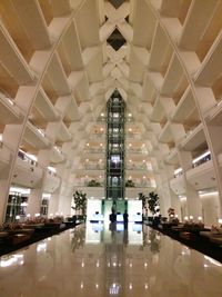 Interior of illuminated shopping mall