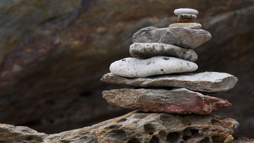 Close-up of stone stack on rock