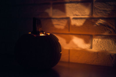 Close-up of pumpkin on wall