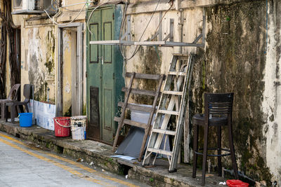 Empty chairs in abandoned building