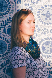 Portrait of young woman looking away