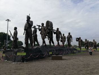 People in park against sky