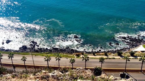 High angle view of road and sea