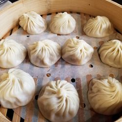 High angle view of chinese dumplings in wooden container