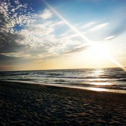 Scenic view of sea at sunset