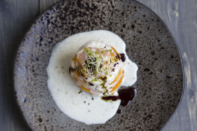 Directly above shot of dessert served in plate on table