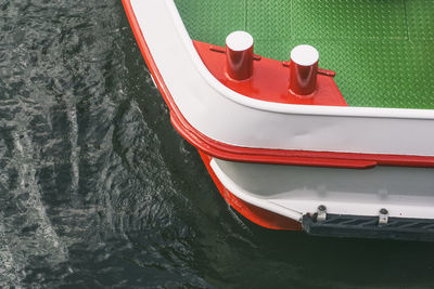 High angle view of red boat sailing in lake