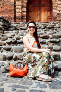 Beautiful young woman at the historical san antonio church located in the city of cali in colombia