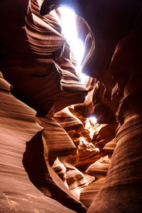 Low angle view of rock formations at night