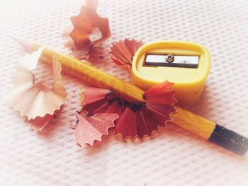 Close-up of yellow pencils on table