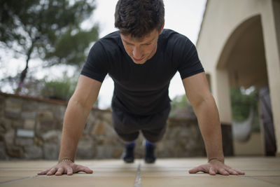 Low angle view of man exercising