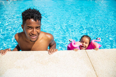 High angle view of woman swimming in pool