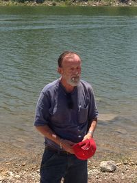 Full length of man standing in lake