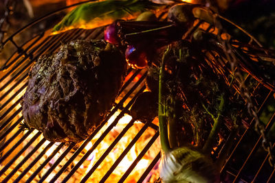 High angle view of meat on barbecue