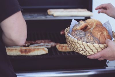 Midsection of person preparing food