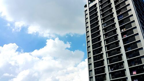 Low angle view of modern building against sky