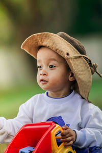 Portrait of boy wearing hat