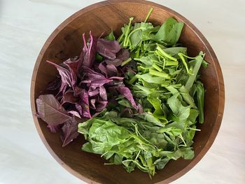 High angle view of chopped vegetables in bowl on table