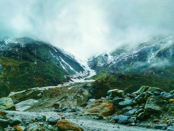 Scenic view of snowcapped mountains against sky