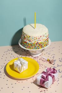 Close-up of cake against white background