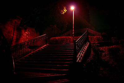 Low angle view of illuminated staircase at night