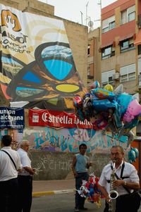 Woman standing in front of building