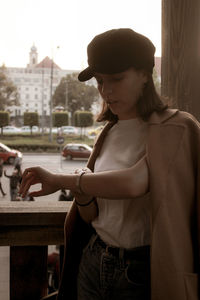 Young woman looking at city