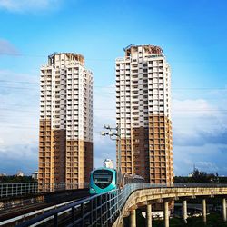 Low angle view of modern buildings against sky