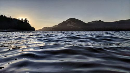 Surface level of sea against sky