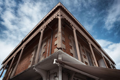 Low angle view of old building against sky