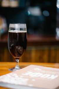 Close-up of beer in glass on table