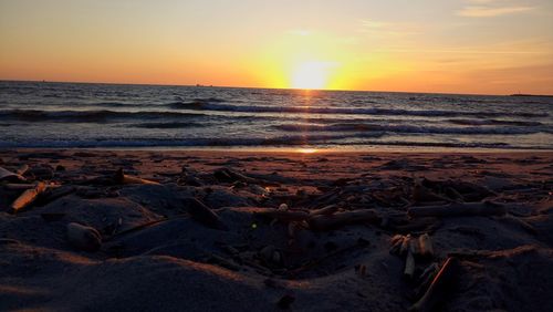 Scenic view of sea against sky during sunset