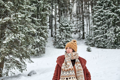 Woman on snow covered land