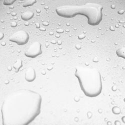 Close-up of water drops on glass