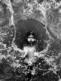 Portrait of woman swimming in sea