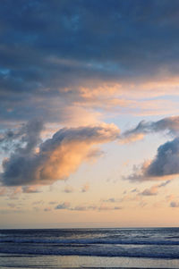 Scenic view of sea against sky at sunset