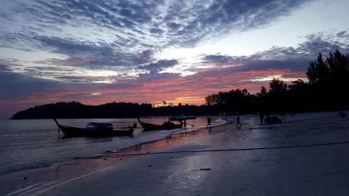 Scenic view of sea at sunset