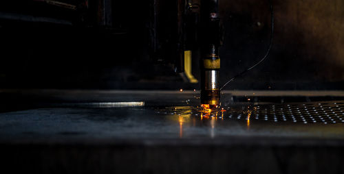 Close-up of welding machine on metal