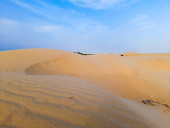 Scenic view of desert against sky