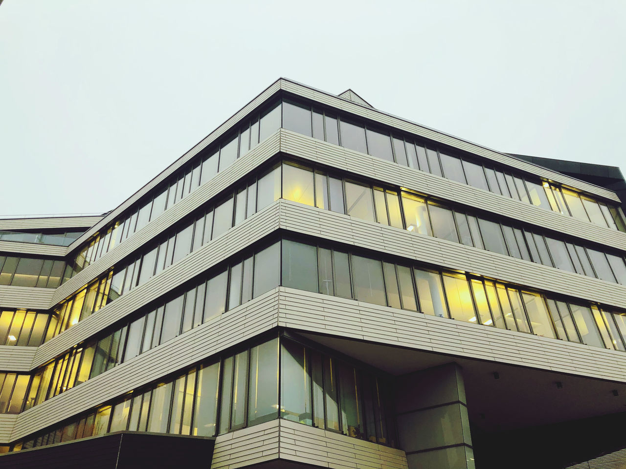 architecture, built structure, building exterior, building, city, sky, facade, low angle view, no people, tower block, office, office building exterior, headquarters, window, brutalist architecture, nature, clear sky, outdoors, business, day, residential district, commercial building