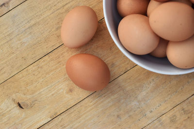 High angle view of eggs in bowl on table