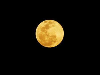 Scenic view of moon against dark sky